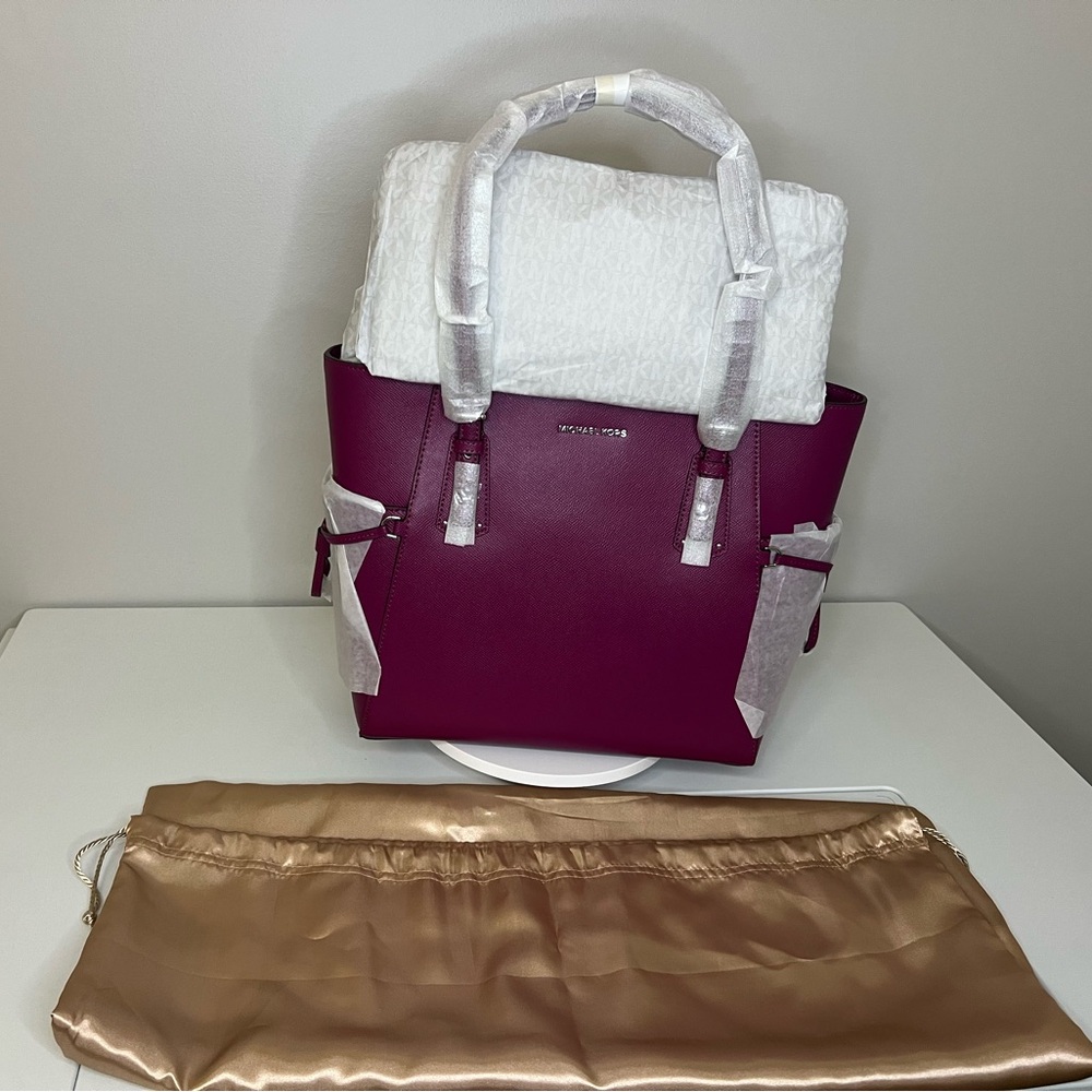BNWT Michael Kors Voyager tote in Garnet
